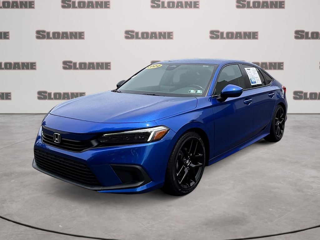 2024 Honda Civic Sport in Blue — front three-quarter view