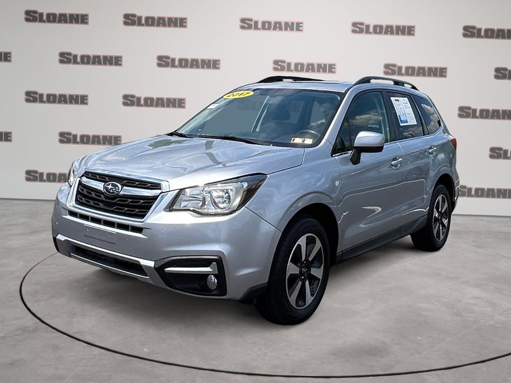 2017 Subaru Forester 2.5i Limited in Ice Silver Metallic — front three-quarter view