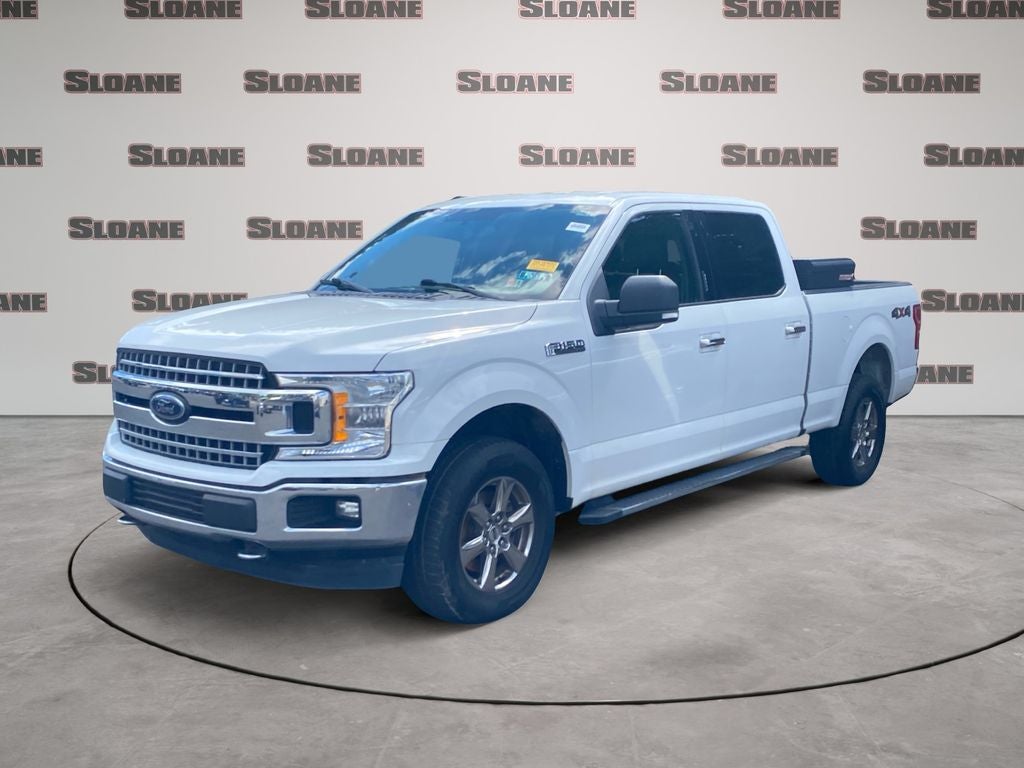 2018 Ford F-150 XLT in Oxford White — front three-quarter view