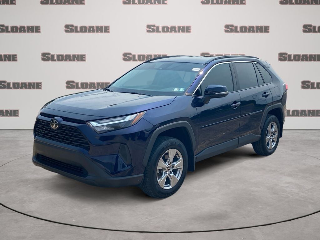 2024 Toyota RAV4 XLE in Blueprint — front three-quarter view