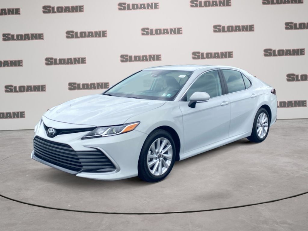 2024 Toyota Camry LE in Ice Edge — front three-quarter view