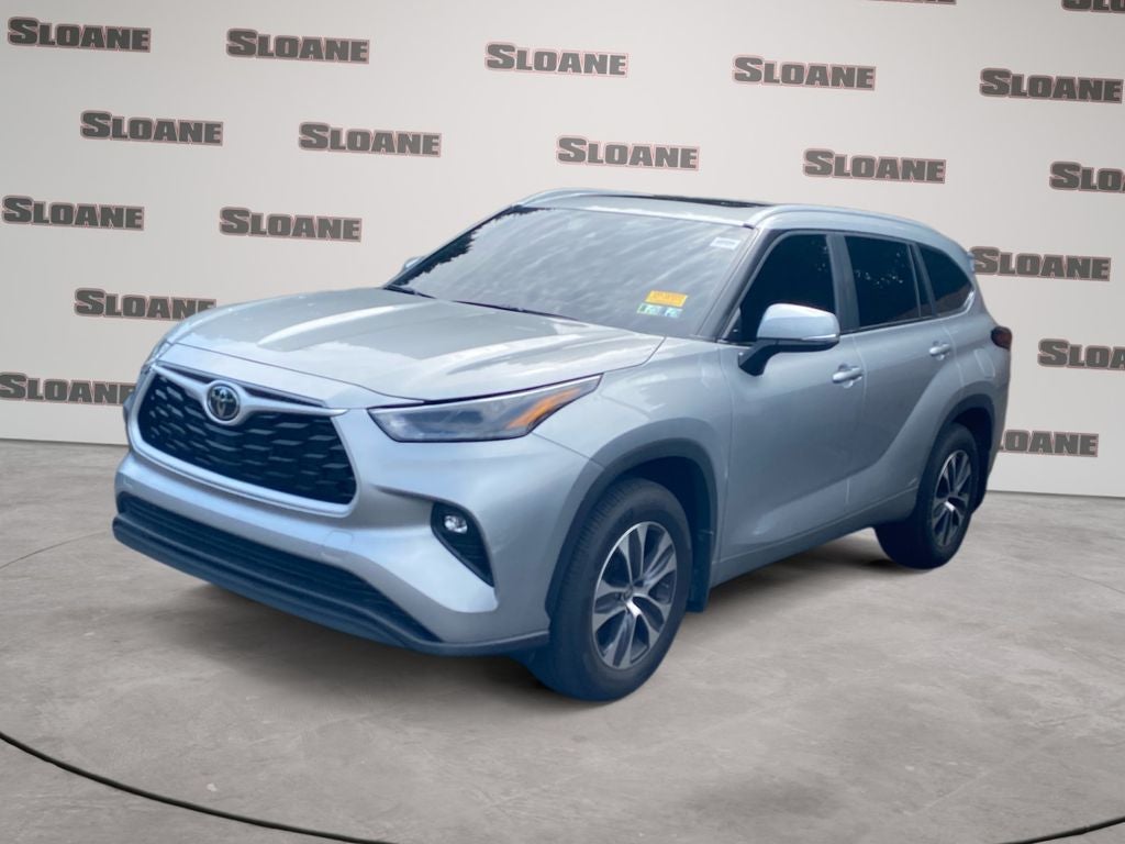 2024 Toyota Highlander XLE in Celestial Silver — front three-quarter view