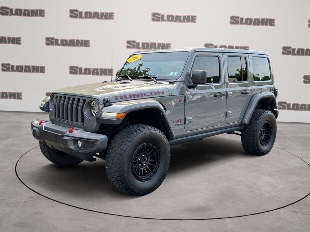 2022 Jeep Wrangler Unlimited Rubicon in Sting-Gray Clearcoat — front three-quarter view
