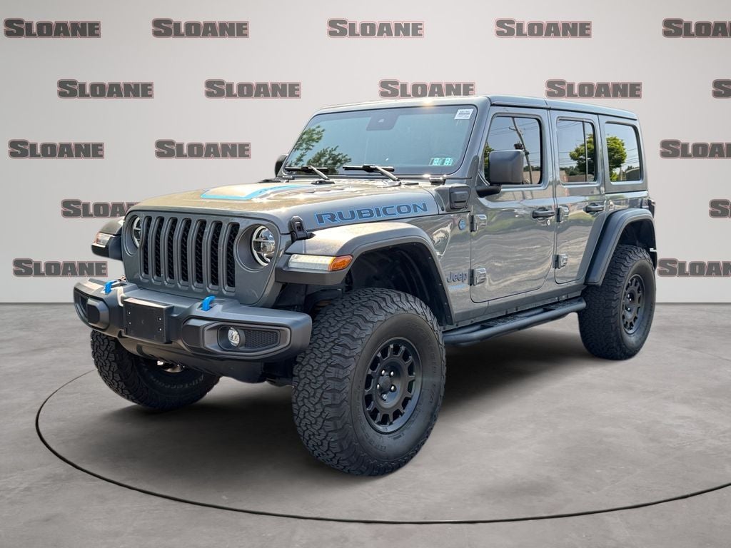 2021 Jeep Wrangler Unlimited Rubicon 4xe in Sting-Gray Clearcoat — front three-quarter view