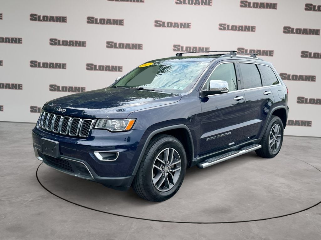 2017 Jeep Grand Cherokee Limited in True Blue Pearlcoat — front three-quarter view