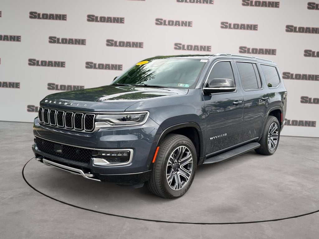 2023 Jeep Wagoneer Series II in River Rock — front three-quarter view