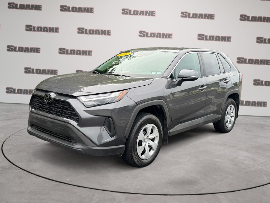 2025 Toyota RAV4 LE in Magnetic Gray Met. — front three-quarter view
