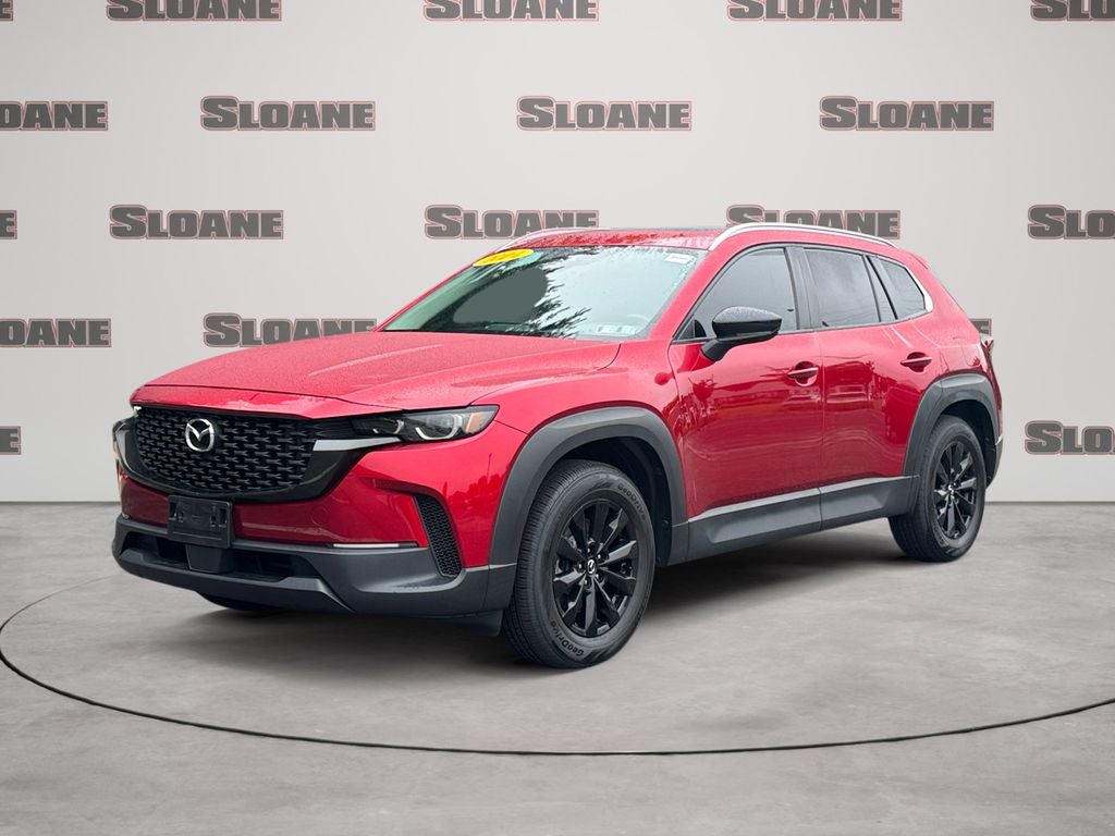2024 Mazda Mazda CX-50 2.5 S Premium Package in Soul Red Crystal Metallic — front three-quarter view