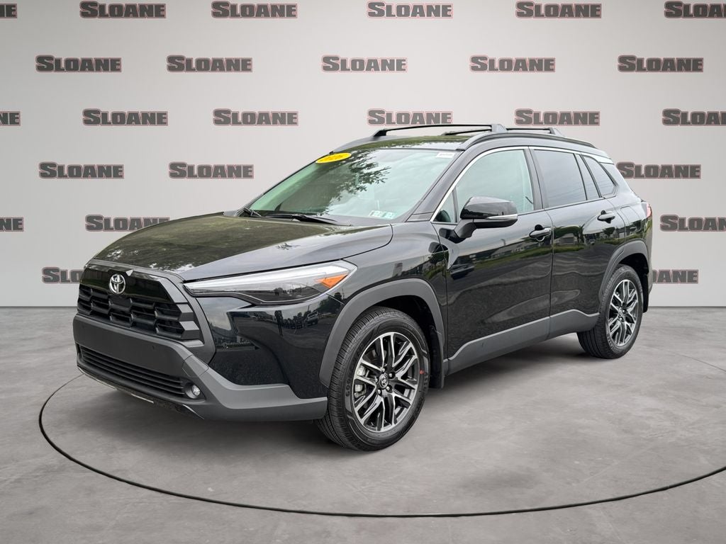 2026 Toyota Corolla Cross XLE in Jet Black — front three-quarter view