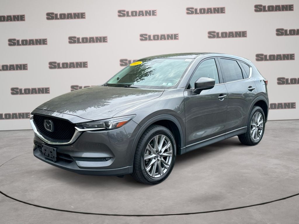2021 Mazda Mazda CX-5 Grand Touring in Machine Gray Metallic — front three-quarter view