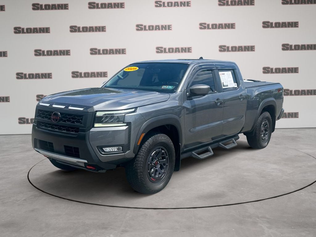 2025 Nissan Frontier PRO-4X in Gun Metallic — front three-quarter view
