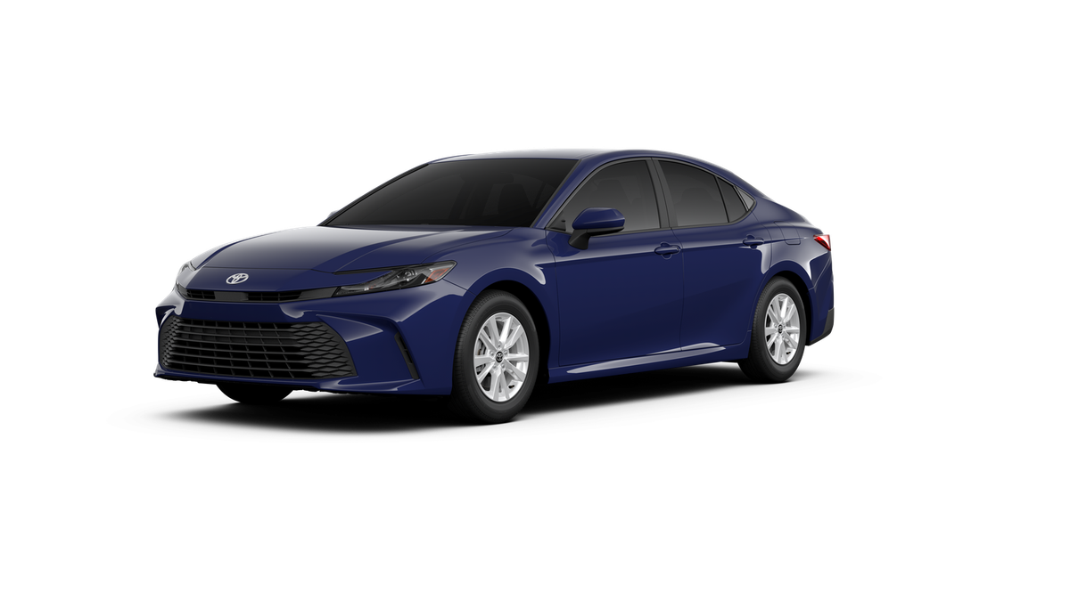 2026 Toyota Camry LE in Reservoir Blue — front three-quarter view